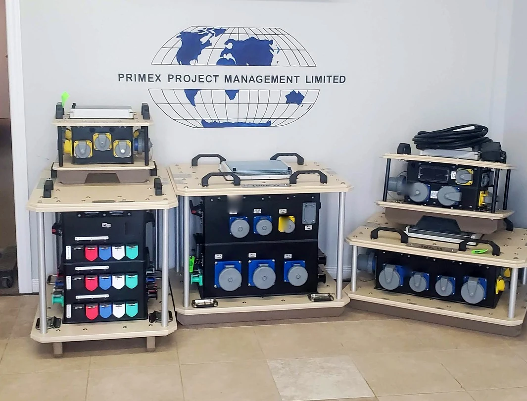 Power distribution equipment displayed beneath the Primex logo at our building entrance